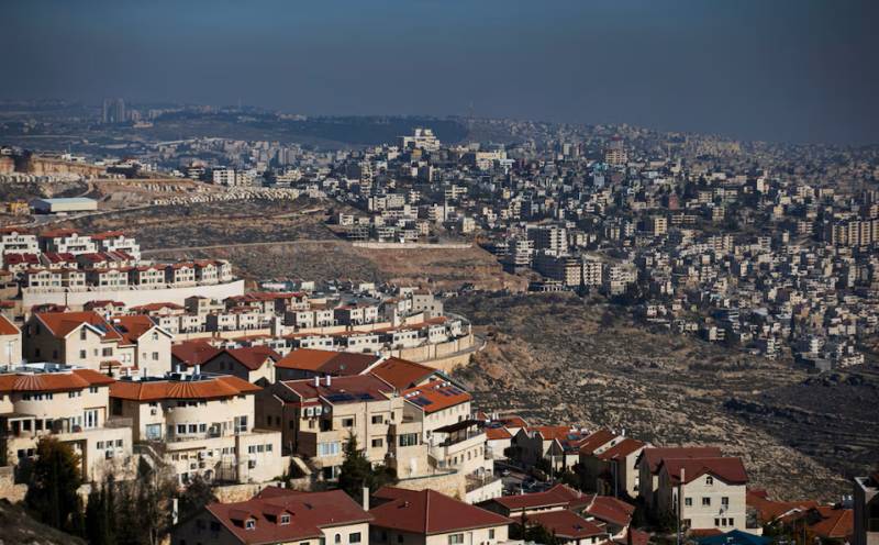 Israel grants legal status to 19 West Bank settlements