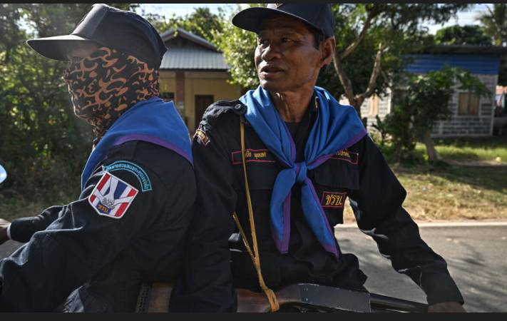 Volunteers patrol Thai villages as artillery rains at Cambodia border