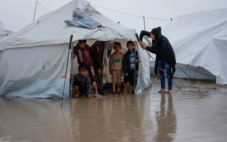 Severe weather and Israeli attacks deepen crisis for Palestinians in Gaza