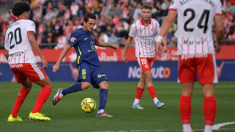 Atletico go third with comfortable win at Girona
