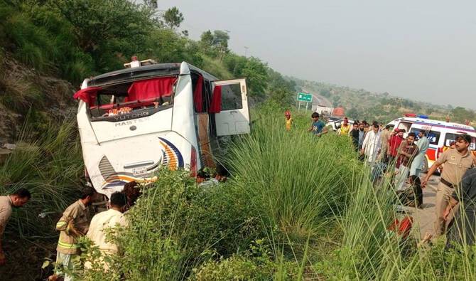 Four die as passenger bus rams into ambulance in Khanpur