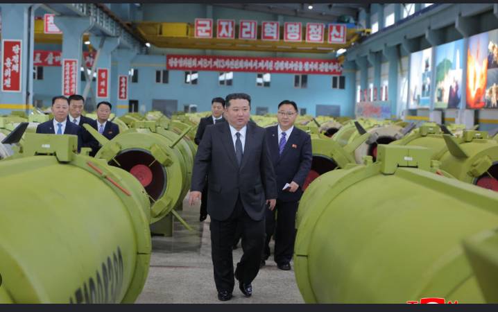 North Korea's Kim orders factories to make more missiles in 2026