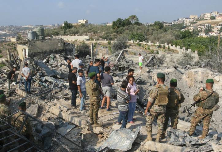 Israel army says striking Hezbollah targets in Lebanon