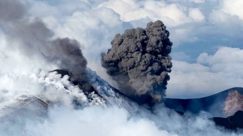 Snow-capped Mount Etna erupts, ash clouds over Italy