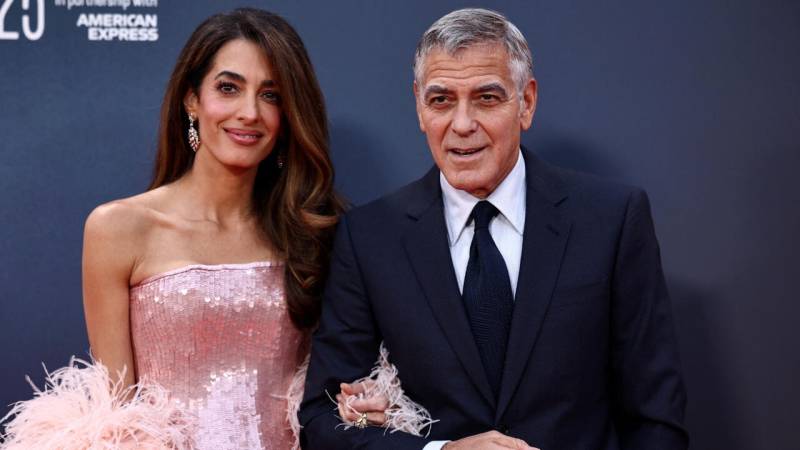 George Clooney, his wife Amal and children become French