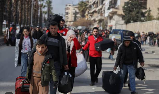 Syria tells civilians to leave Aleppo's Kurdish areas