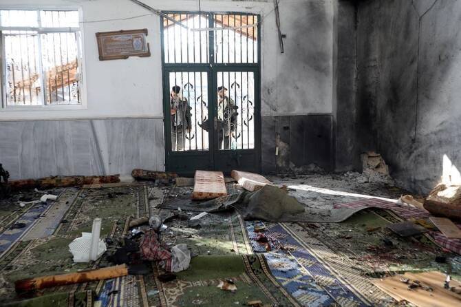 Syria says two IS members arrested over last month's Homs mosque blast