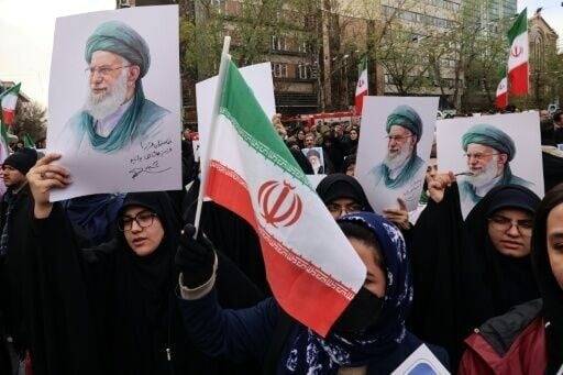 Iran vows to defend itself as Trump says will 'watch it and see'