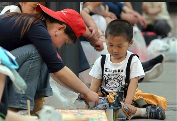 China's birth rate falls to lowest on record