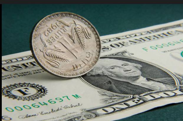 Indian rupee slumps to record low against dollar as foreign investors flee
