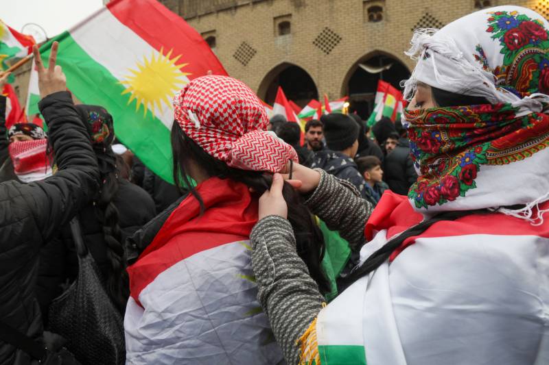 Kurdish women braid their hair in show of solidarity with Syria Kurds