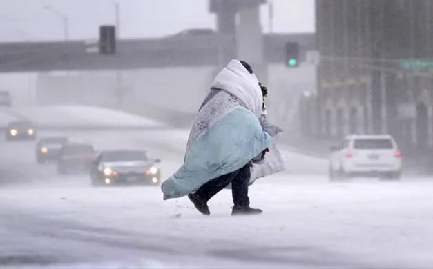 Massive winter storm sweeps across US bringing ice, frigid temps