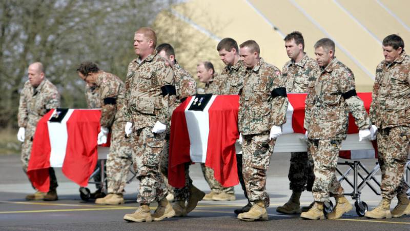Trump praises UK troops as row over his NATO comments grows