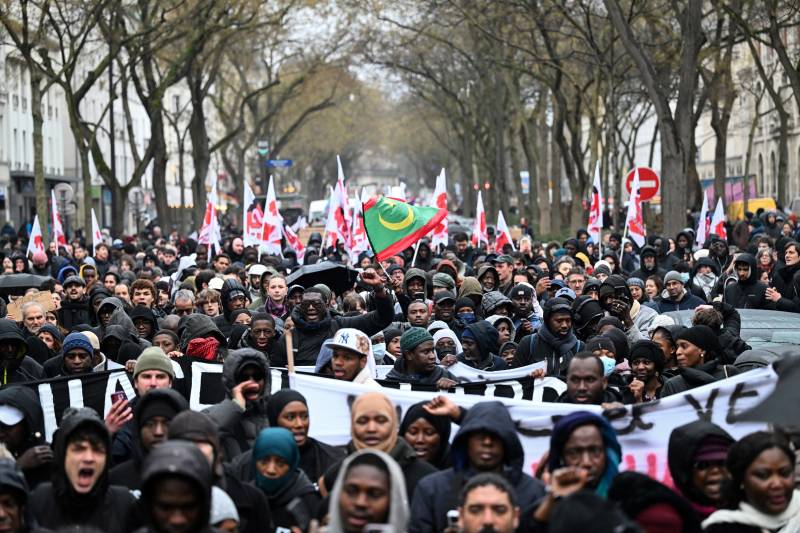 Thousands protest in Paris over death of migrant worker