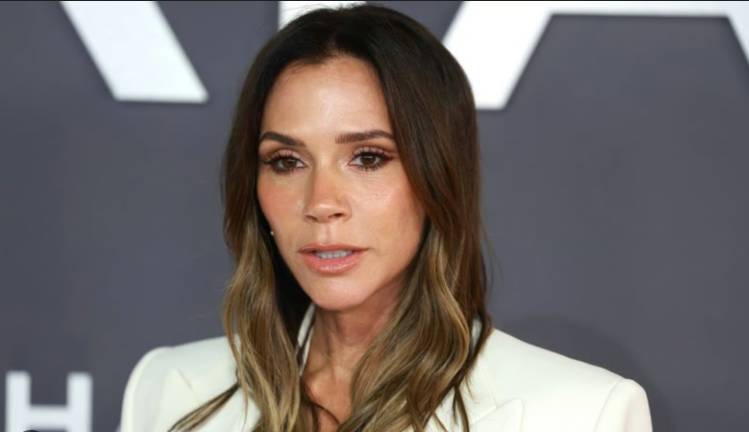 Victoria Beckham honoured in Paris amid family rift