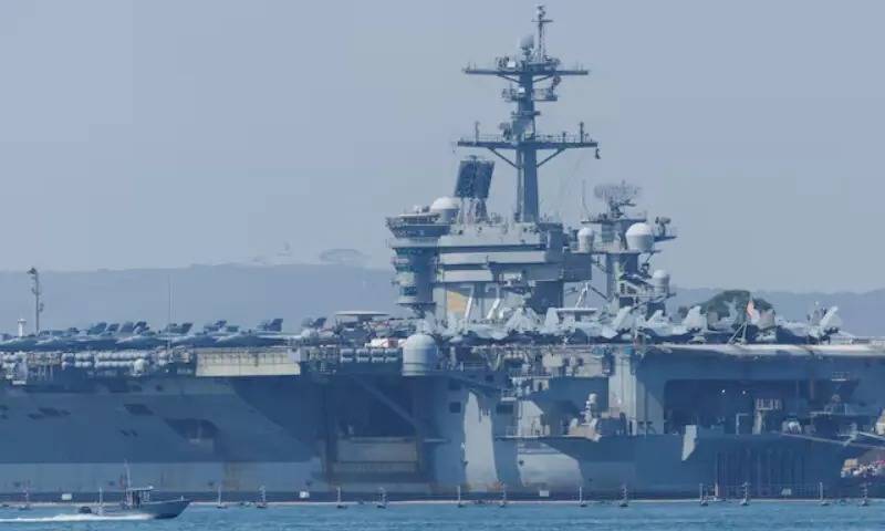 Iran warns against 'instability' after US strike group arrives