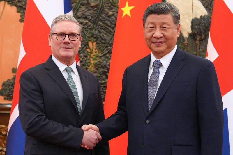 Xi calls on China, Britain to jointly advocate true multilateralism