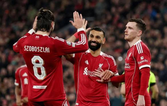 Salah ends drought as Liverpool hit Qarabag for six to reach Champions League last 16