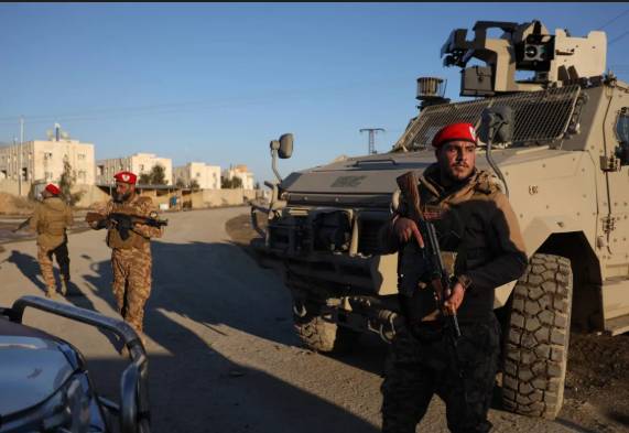 Syria Kurds impose curfew in northeast cities before govt deal begins