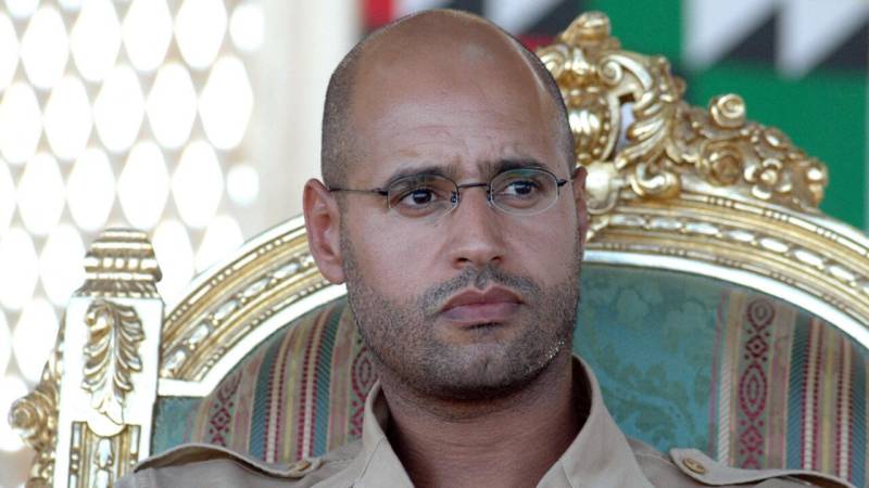 Who is behind the killing of late ruler Gaddafi's son, and why now?