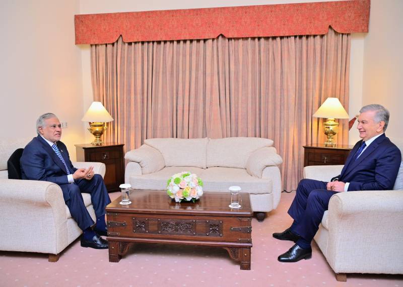 Dar greets Uzbek President Shavkat at first meeting after arrival in Pakistan