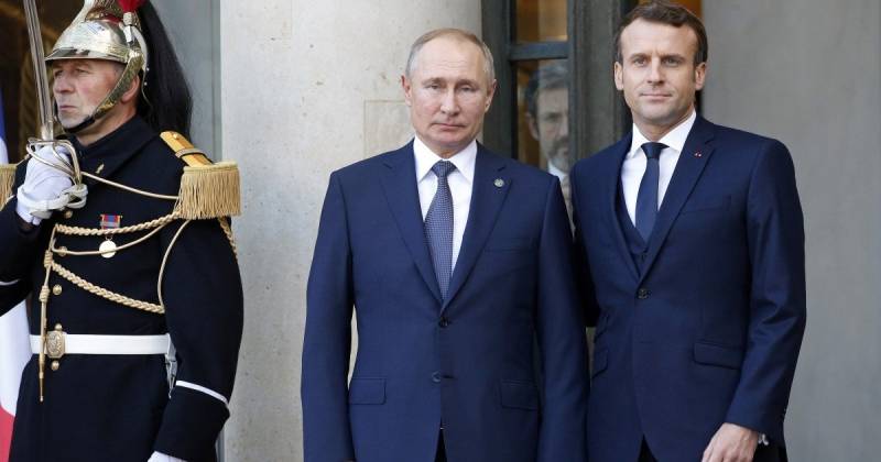 Macron says wants 'European approach' in dialogue with Putin