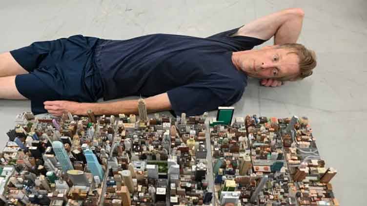 New York model, carved in a basement, goes on display