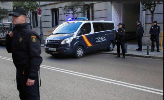 Spain arrests 'man of a thousand names' wanted in Peru