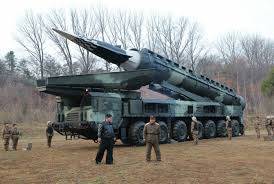 North Korea flexes nuclear-capable rocket-launcher