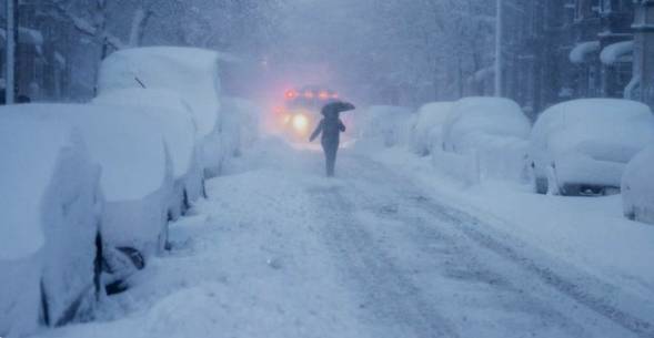 Winter storm blankets US northeast as travel bans imposed