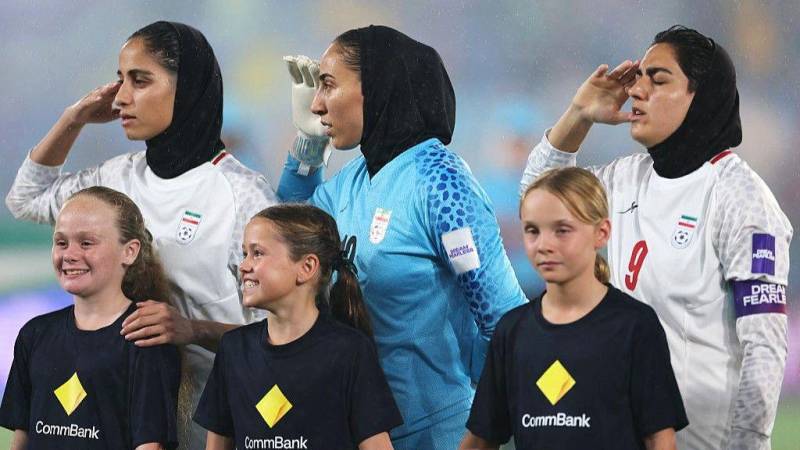 Iran players salute and sing national anthem at Women's Asian Cup