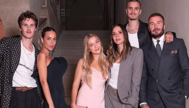  Victoria Beckham enjoys family support at Paris show