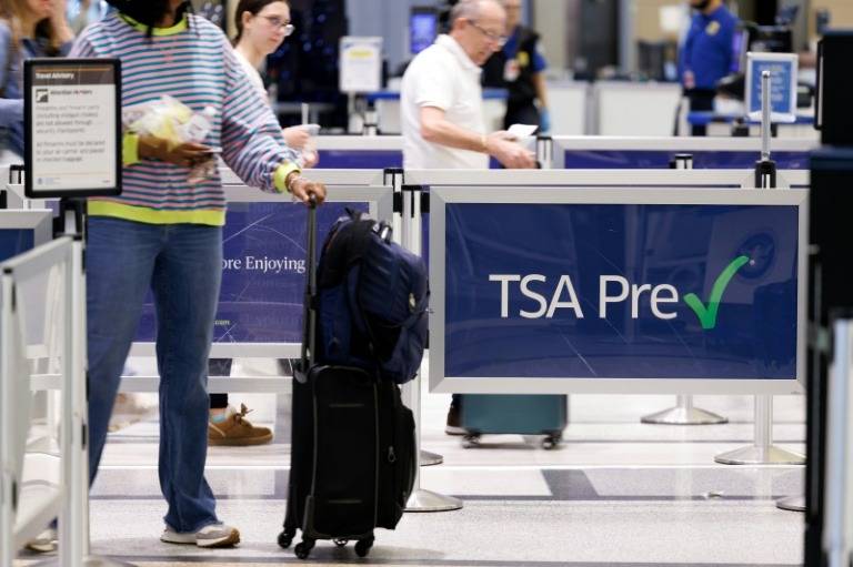 Airport workers miss pay as US government shutdown hits one month