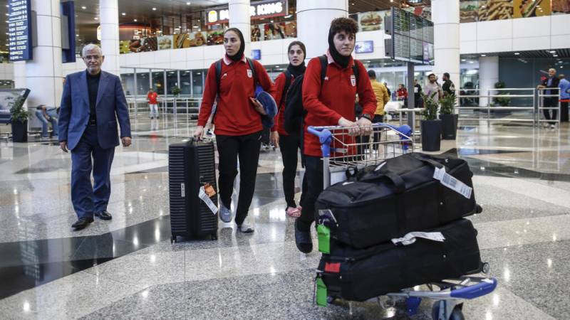Three Iranian football team members leave asylum in Australia