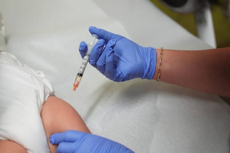 US judge halts implementation of Trump vaccine overhaul