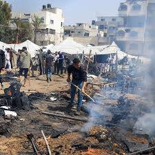 Gaza civil defence says Israeli strike kills one, tents on fire