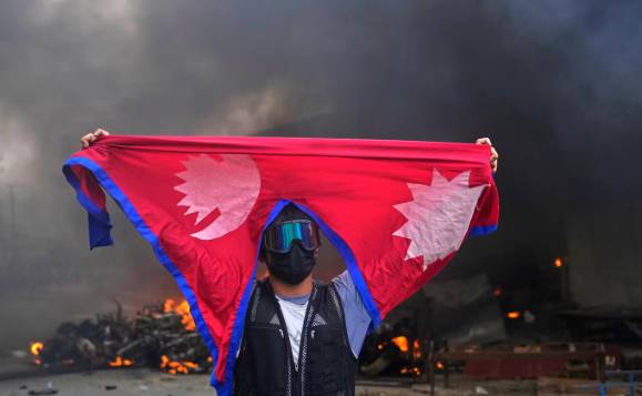 Nepal report into deadly uprising recommends prosecuting ex-PM