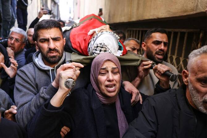 West Bank Palestinians bury teenager shot dead by Israeli forces