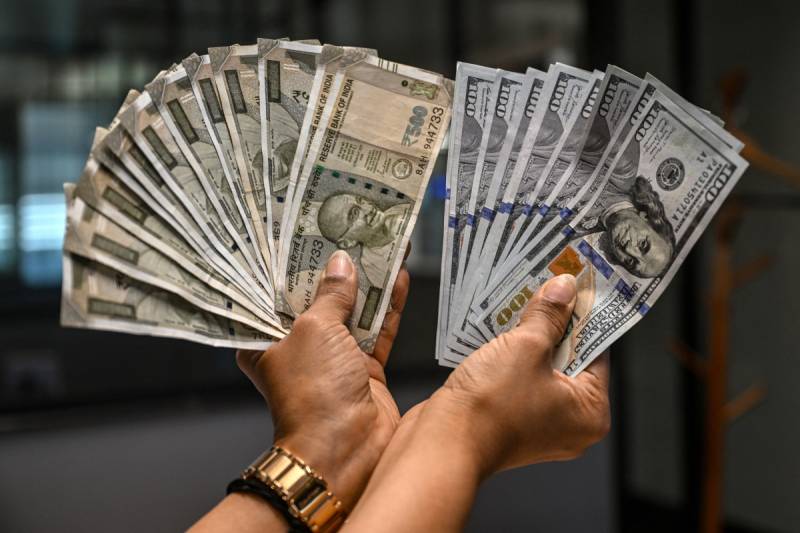 Indian rupee hits fresh record low past 95 per dollar