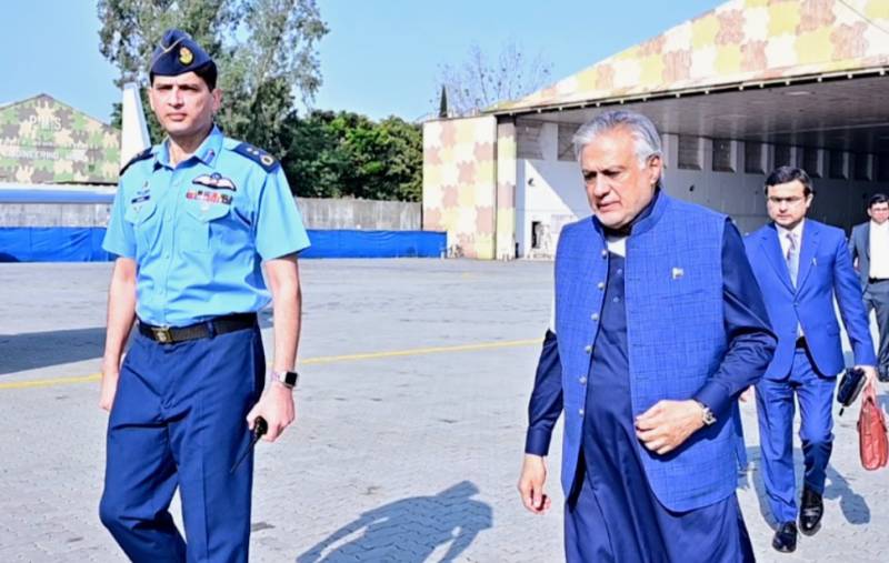 With bandaged arm, Ishaq Dar leaves for China