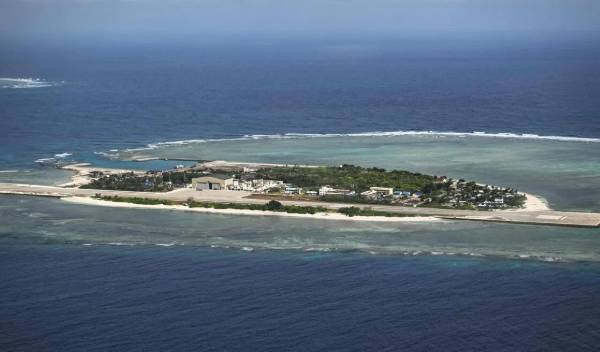 China opposes Philippines renaming disputed South China Sea islands