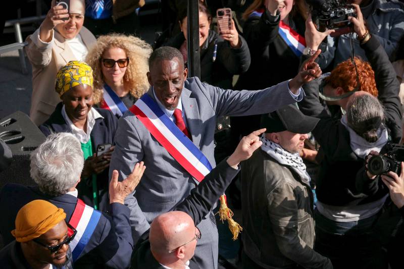 Thousands rally against racism in Paris suburb to defend mayor