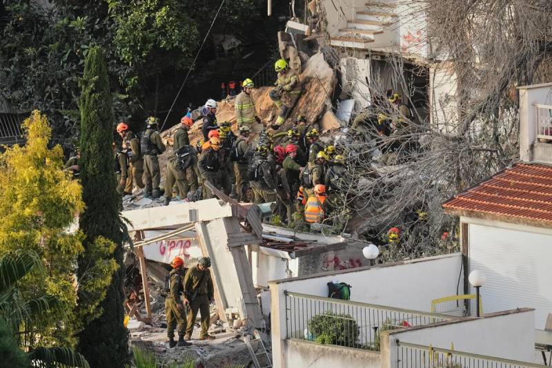 Four dead as Israeli rescuers search for missing in Iran strike on building