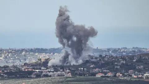 Israel's Netanyahu, in south Lebanon, says threat of invasion removed