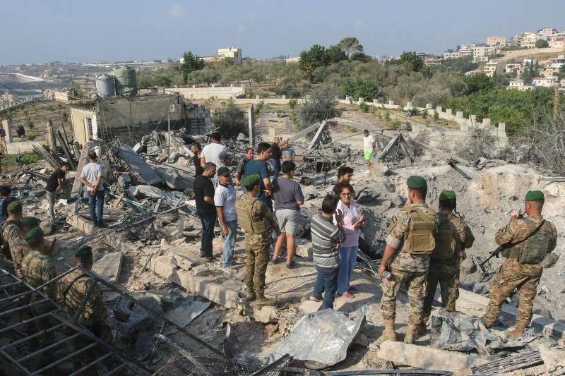 Israel says troops fighting Hezbollah surrounded key Lebanon town