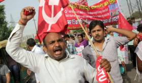 Worker protests erupt in India as anger grows over economic policies