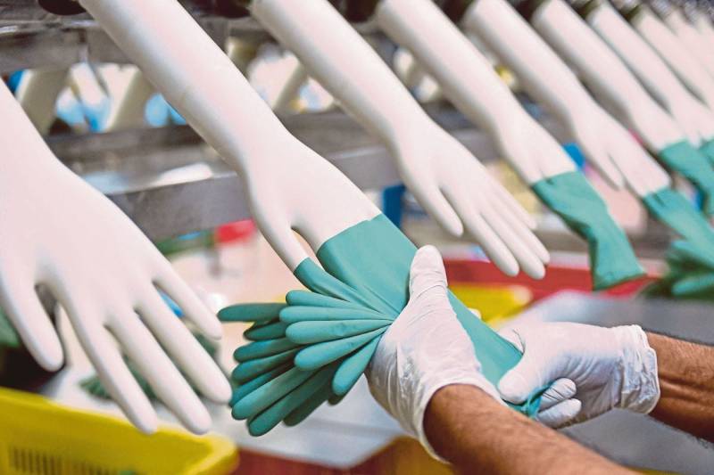 Japan to release 50 million medical gloves to ease supply crunch