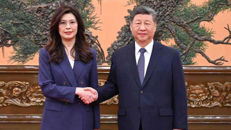 Xi Jinping - Cheng Li Wun handshake ripples US