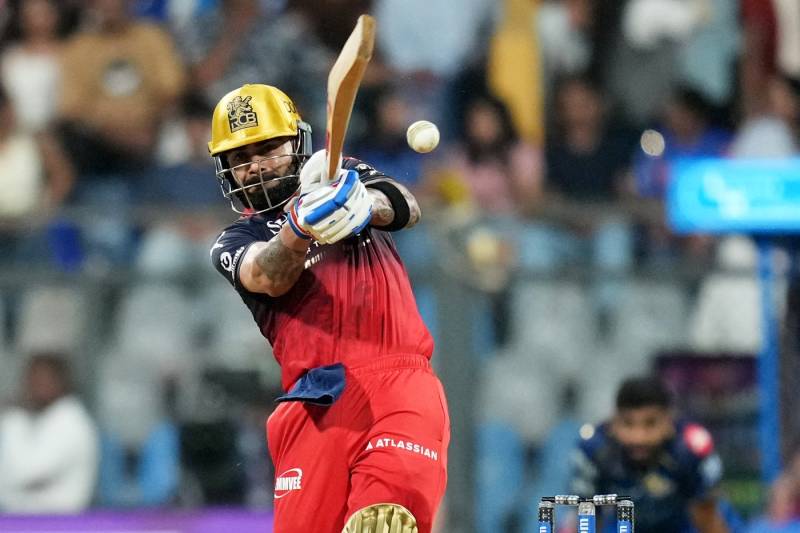 Kohli makes Gujarat pay as Bengaluru cruise to IPL win