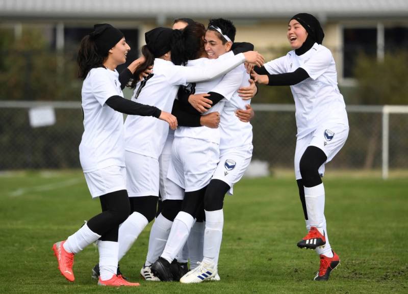 Afghan women footballers celebrate 'historical moment'